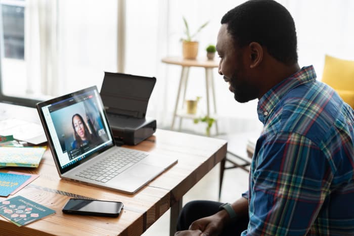 Working from home has its disadvantages, but also has shown to improve overall job satisfaction and morale for employees.