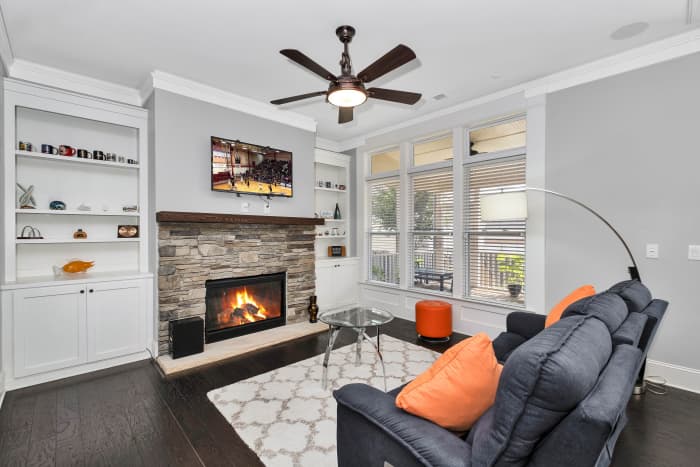 Murphy's Oil Soap works wonders to clean ceiling fans. Also be sure to switch your fan to winter mode.