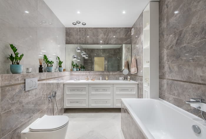 Consider updating your bathroom walls. Inserting panels can make your bathroom look more luxurious. Marble and stone textures are a plus.
