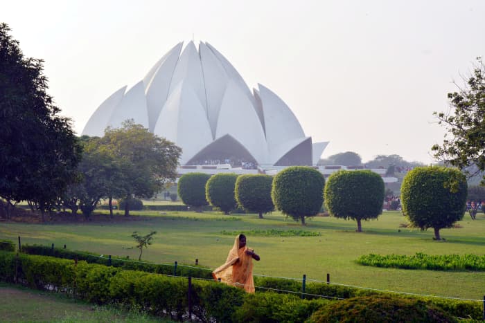 The gardens of the Baha'i Lotus Temple offer a conducive atmosphere for quiet reflection.