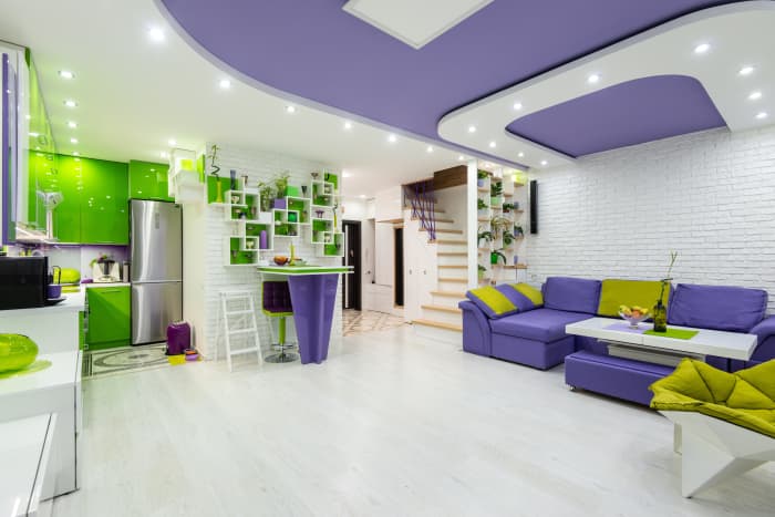 The keyword for the Chinese Zodiac Goat in interior design is eclectic. You don't want the same color or pattern broadcast in one room. Try this style of mixing different colors. Green + purple = fun.