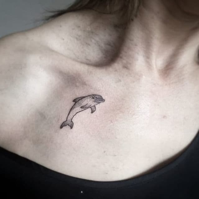 The Legendary Meaning of Dolphin Tattoos - TatRing