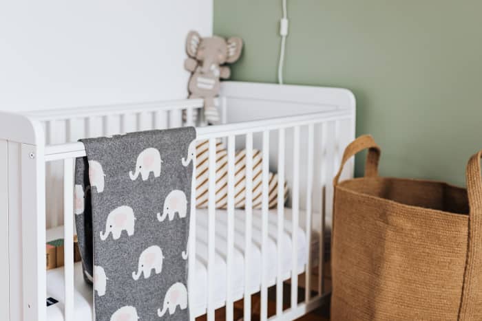 If this was Family Feud, the number one answer for the question "what would you find in a nursery" would likely be a crib.