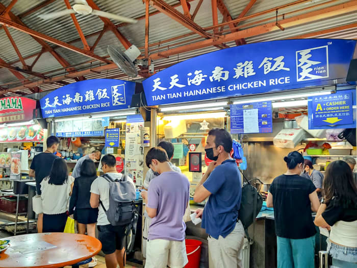 Late afternoon queue at a popular chicken rice stall at Maxwell Food Centre. This stall is regarded as one of the best chicken rice in Singapore.