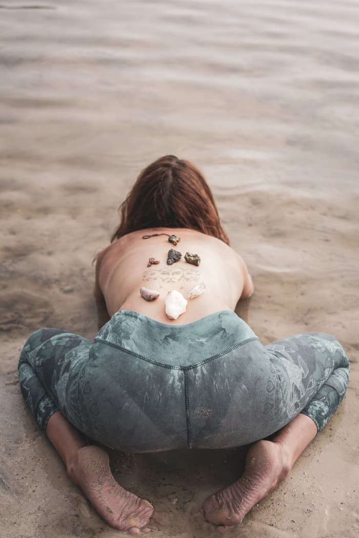 Crystal healers place crystals on the body in order to clear blockages or realign energy.