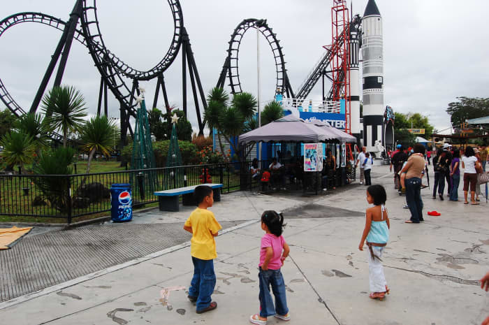 The Space Shuttle is a thrilling roller coaster ride that turns guests upside down six times in two minutes, three times forward and three times backward.