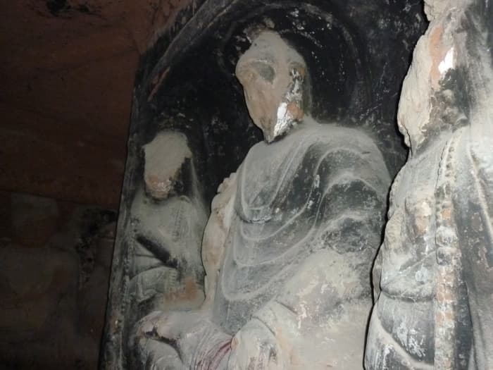 Buddhist statues were defaced during the Cultural Revolution (1966–76), which sought to eradicate all semblance of traditional Chinese culture.