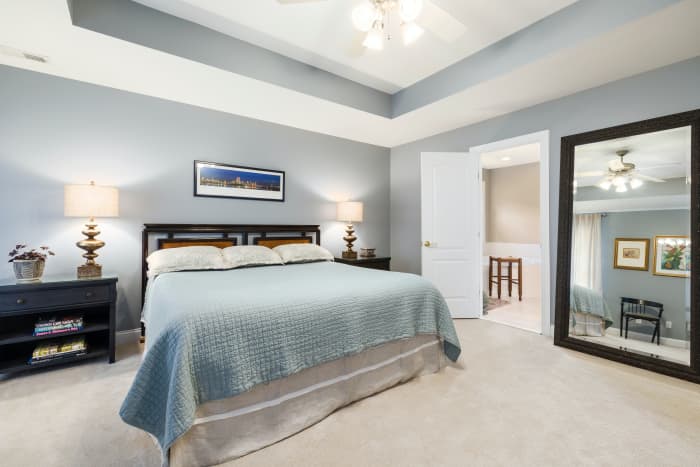 Consider the scale of your furniture. Most bedrooms can fit 1-2 large furniture pieces before getting too overwhelmed.