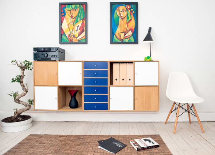 Modular storage can make it easier to hide your knickknacks. It's also great for storing kid items, clothes, books, and tools.
