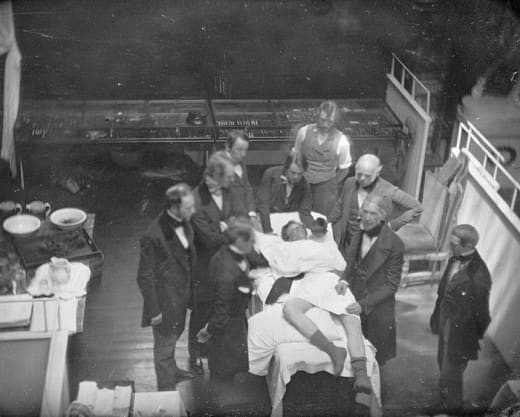 Re-enactment of the first public demonstration of general anesthesia by William T. G. Morton on October 16, 1846 in the Ether Dome at Massachusetts General Hospital, Boston.