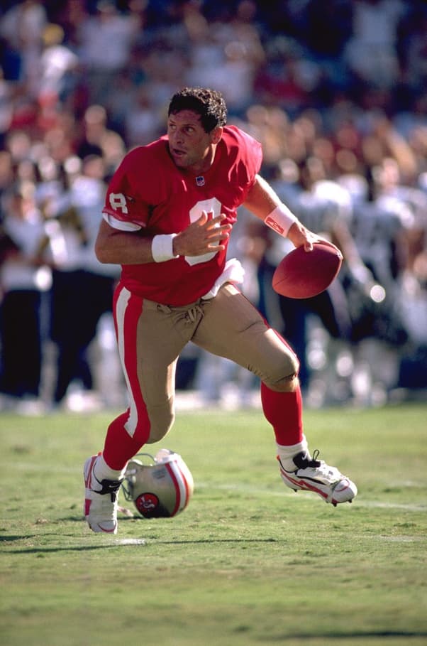 Young was a tough son of a gun. He wouldn't run out of bounds after losing his helmet. Thank goodness nowadays they stop the game if that happens.
