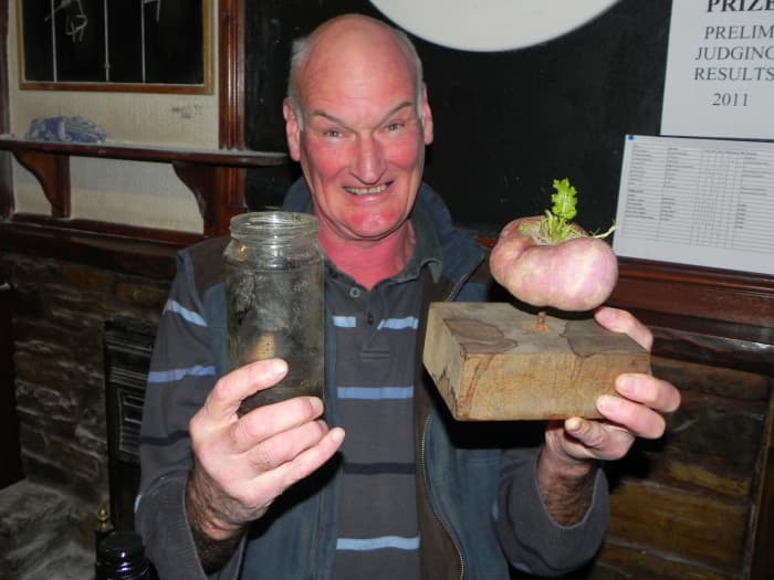 The 2011 trophy winner was Jim Drew, holding his entry, a jam jar filled with muddy water entitled “Jamming with Muddy Waters.”