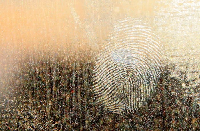The surface on which the fingerprint impression is being photographed will determine aspects of the photographer's technique.