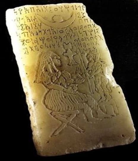 An amulet with Wadd and his known symbols, the moon, snake and Venus One of the few remaining items depicting Wadd and the magic formula with his theophoric name.