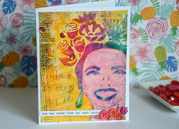 Whatever color is under the area the gel is applied to will show through the gel. And generally speaking, color mediums applied over will bead off or resist those areas. If you're working with a stencil, consider what colors you'll want to add after