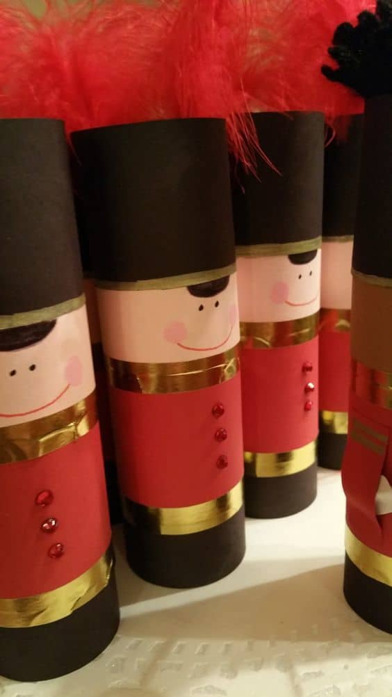 Made with toilet paper tubes, heavy duty construction paper, washi tape, some glue, some feathers and a few packaged rhinestones