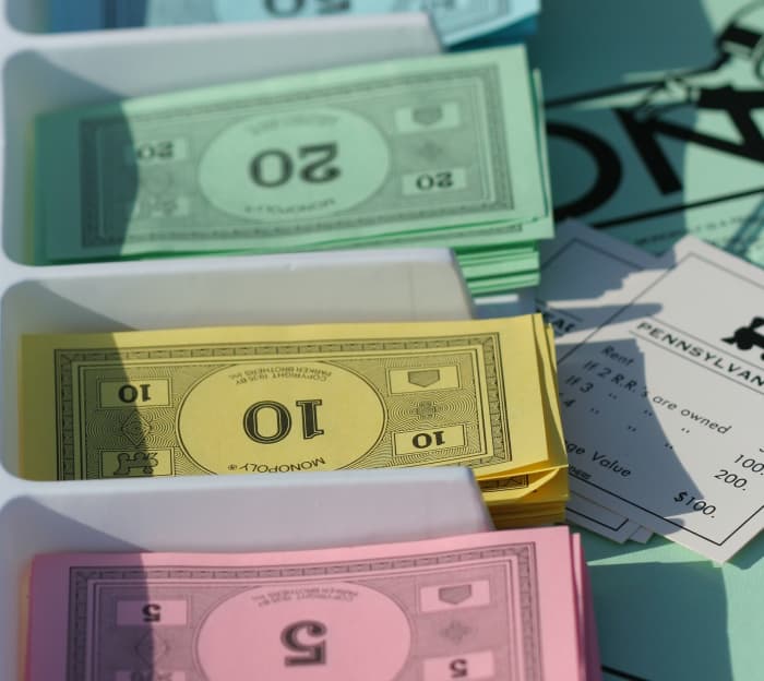 Monopoloy by Parker Brothers is one of the best games for teaching children to add, subtract, estimate, and count money.