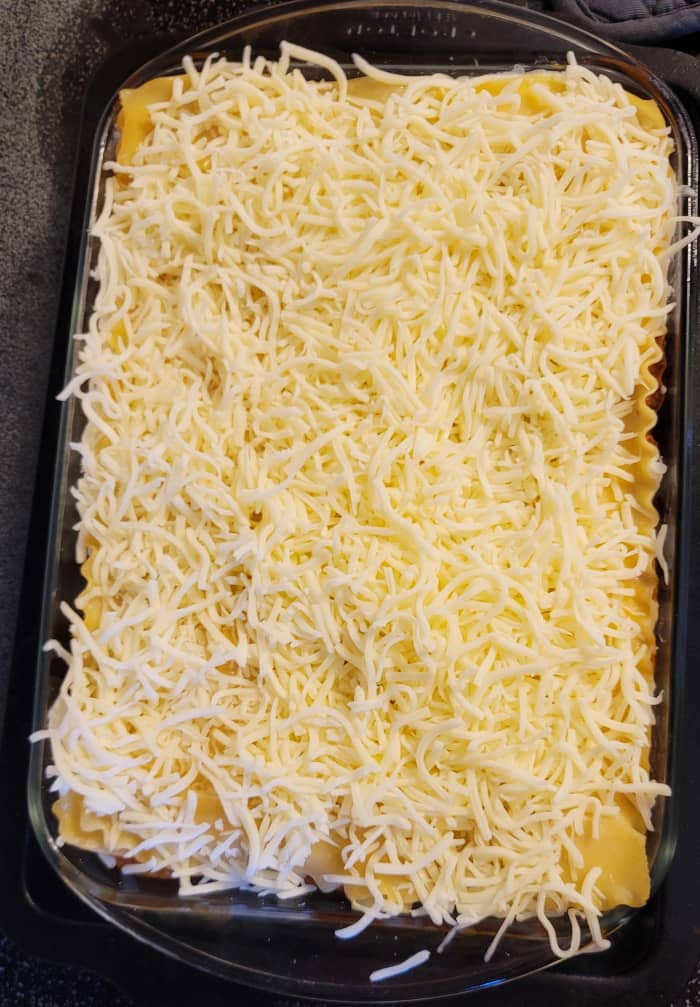Remove aluminum foil. Sprinkle additional mozzarella on top and bake uncovered for 10 - 15 minutes, or until cheese is golden brown.