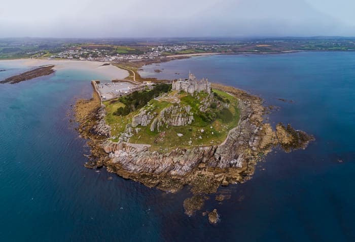 St. Michael's Mount in Cornwall (Ictis) is linked to the mainland by a causeway which is passable when the tide is out.