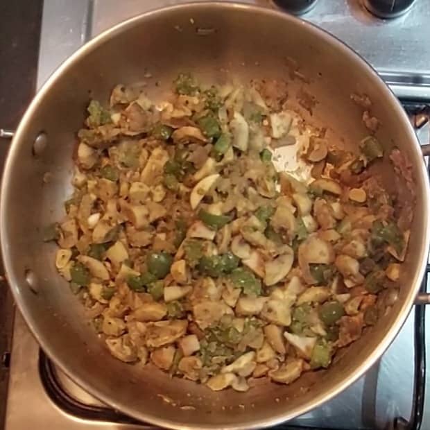 Mix and combine well. Adjust salt. Mix well. Close the lid and cook in low flame till water evaporates completely and mushroom cooked well.