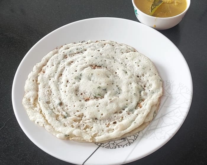 Rava Onion Dosa Semolina Dosa With Fried Onions Delishably