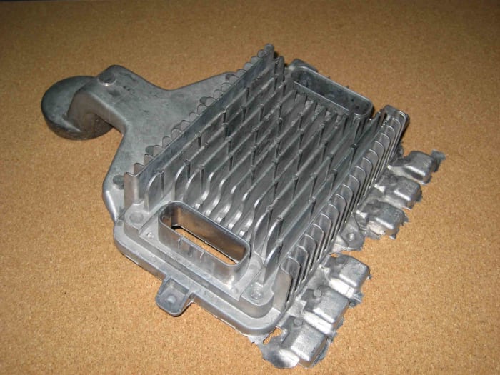 This is a picture of an aluminum heat sink. It's not a radiator, but is similar. Depending on the severity of your leak, radiator stop leak will fix most mild leaks inside your radiator.