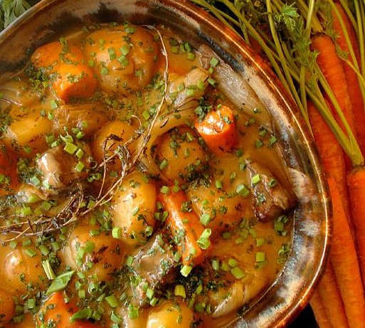 Find lamb shoulder, and trim the fat as you cube it. The result is luscious - tender, velvety pieces of meat in a rich stew.
