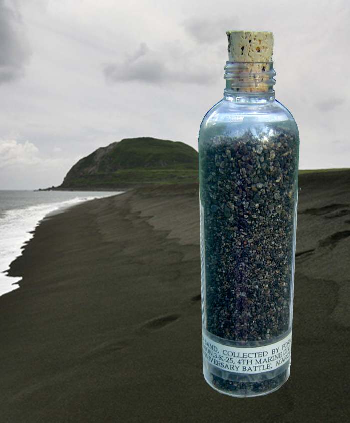 A vial of sand from the beach at Iwo Jima. You can see that Mt. Suribachi is a bit greener now than during the battle.