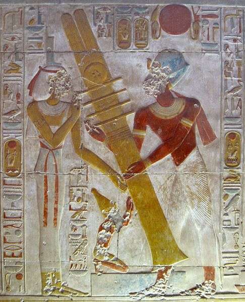 Pharaoh Seti I reestablishes "the pillar of stability" during a royal festival, with the goddess Isis and his own self assisting.