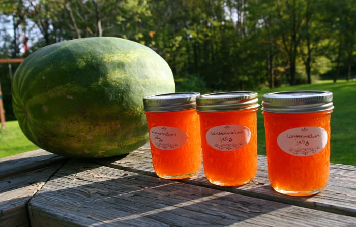 These jars of watermelon jelly were made from Sugar Baby watermelons, which have a reddish pink interior. To switch things up a bit, try making the jelly from heirloom watermelon varieties.