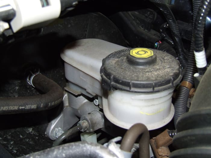 Brake fluid reservoir. if your brake pedal is soft; first check the fluid level to determine if you have a leak in the braking system.