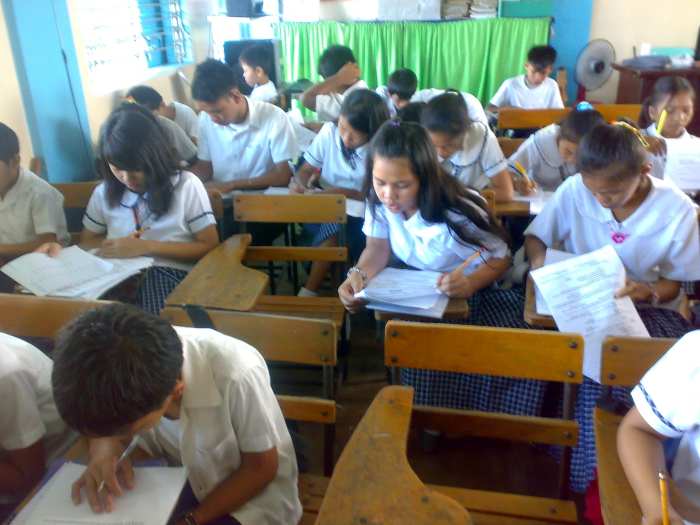 My pupils as they were having their quarterly exams. If you notice, there are vacant seats which signify the absence of some pupils. Some frequently absent students even skip important tests.