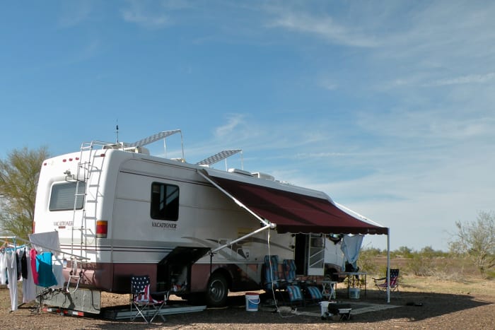 Camping is free in the 14-day BLM area on Plomosa Road near Quartzsite with solar panels up on the roof and wash on the "solar" dryer.