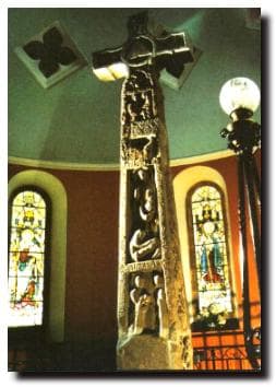 The Ruthwell Cross, near Dumfries, Scotland, is decorated with carved runes depicting aspects of the Rood's speech to the dreamer.