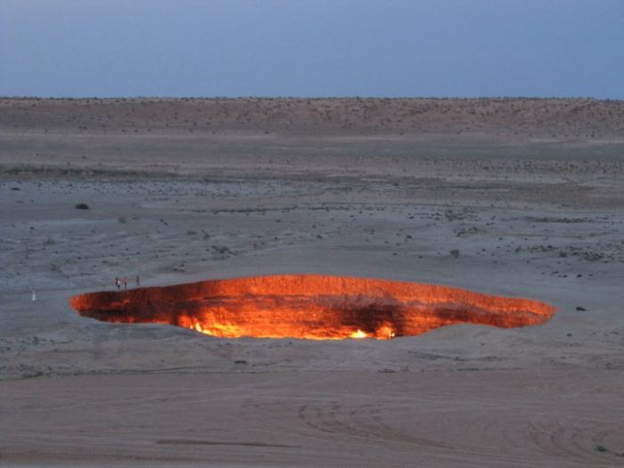 Dusk at the Burning Gates of Turkmenistan. For scale, look closely to see the people at the upper left edge of the crater.