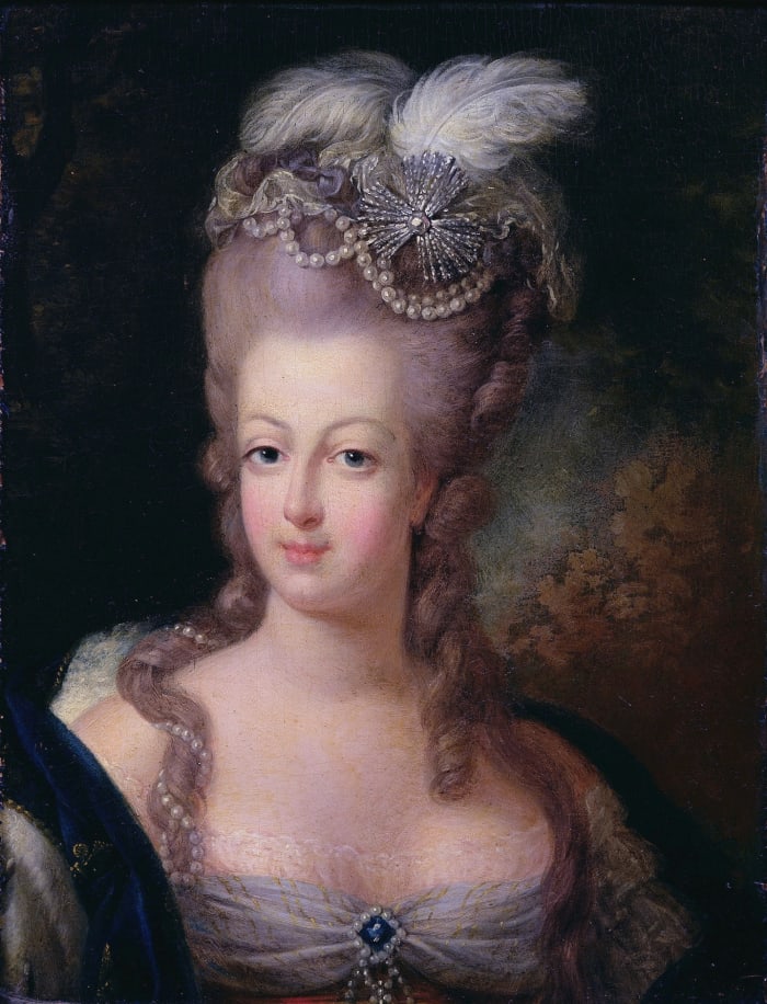 Marie Antoinette sporting the pouf hairstyle in 1775 - an elaborate construction first developed by Léonard Autie