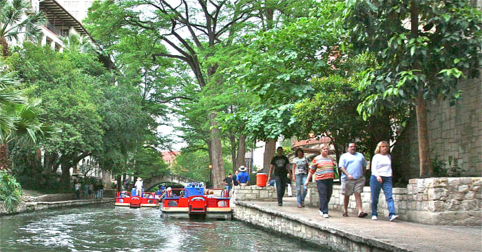 You can take a guided River Boat Tour or stroll along the banks of San Antonio's River Walk during your visit.
