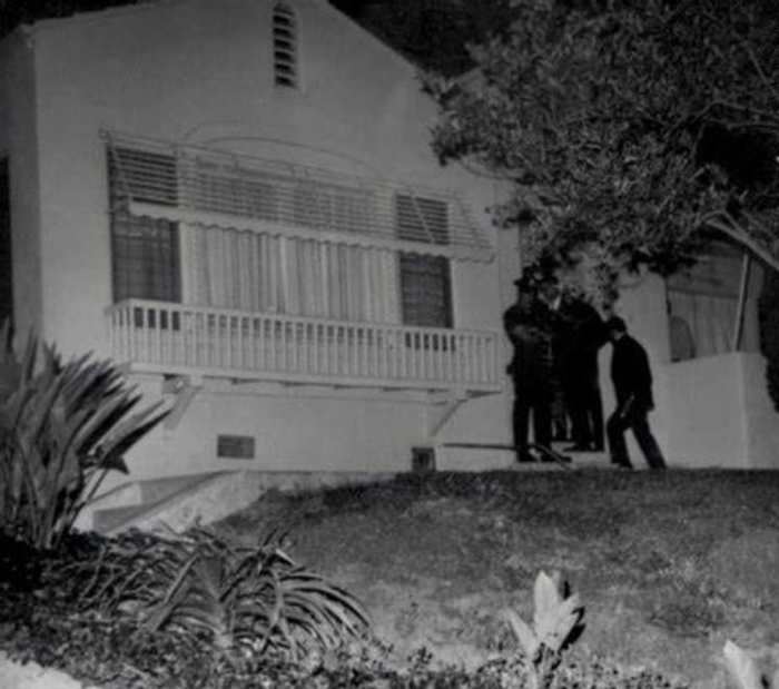 Detectives gather outside the LaBianca residence at 3301 Waverly Drive, in the early morning hours of August 10, 1969.