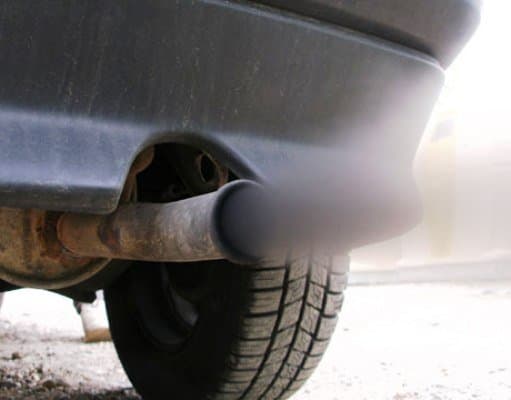 Black smoke from exhaust pipes can be easily corrected in most cases by changing the weight of oil you use.
