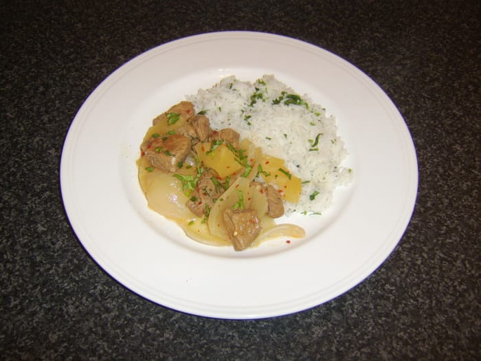 Spicy pork, pineapple and apple cider casserole, served with herb and garlic rice, is just one of the casserole recipes featured on this page