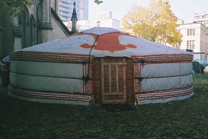 This is a Mongolian Yurt placed downtown Toronto, at St. James Park, next to the St James Cathedral.