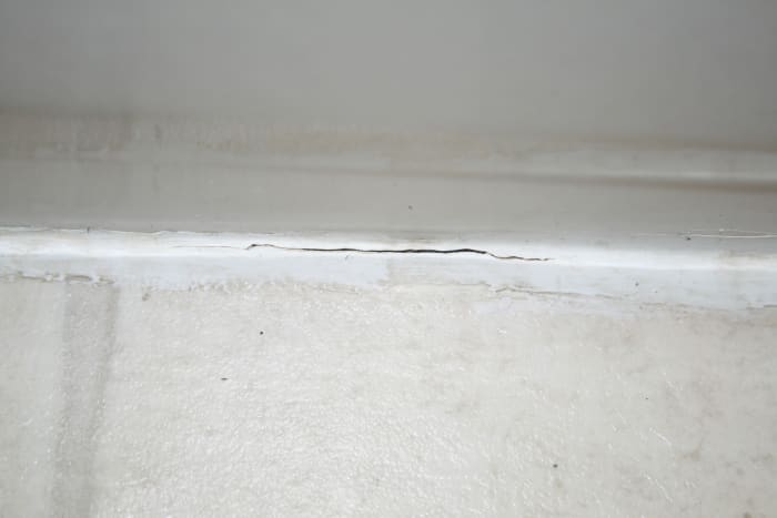The particular project I am working on is removing and replacing the caulk at the bottom of a tub where it meets linoleum. Notice the crack, which allows water to enter and damage the sub floor. Time for some home improvement!