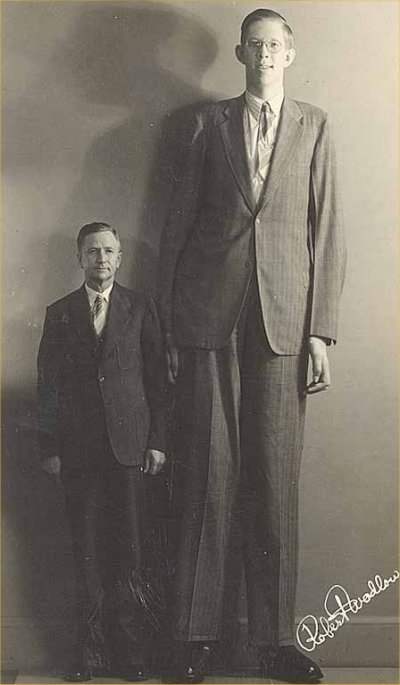 Robert Wadlow, who, at 8' 11", is the tallest person in recorded history. His height was due to a pituitary gland disorder which produced abnormal levels of human growth hormone (HGH).