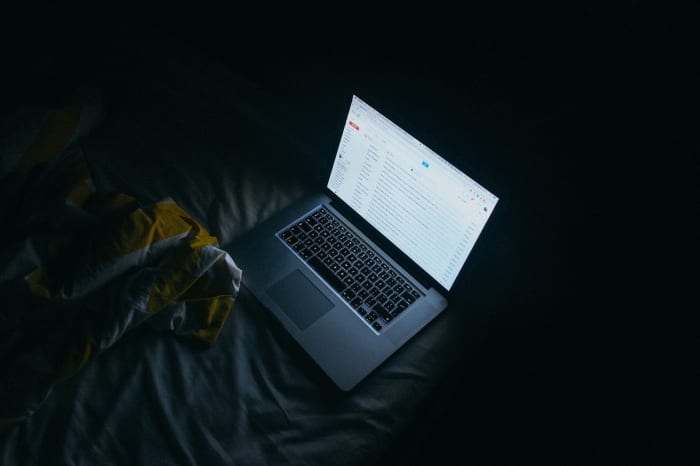 Sending an email to an employee from home, late at night should only be done in an extreme emergency. Most of the time you are better off sleeping on it and composing your email at work the next day, when you mind is clear.