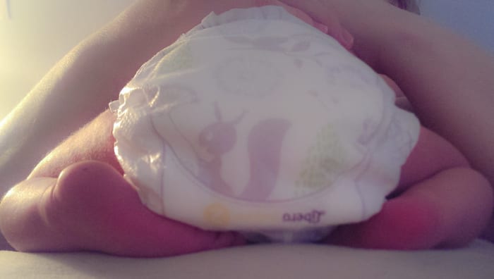 The baby "sits" in the mothers pelvis, with the toes tucked under and the legs snug along the sides.