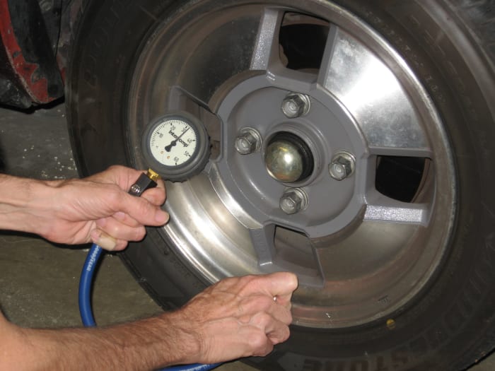 To check tire pressures, you need a good tire gauge, and you need to know the appropriate tire pressures for your tire-wheel-car combination.
