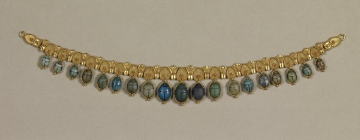 In Ancient Egypt, jewelry played a large part in their society. The richer Egyptians tended to wear the jewelry with gold and gems, whereas the poorer Egyptians usually made theirs out of glass beads.
