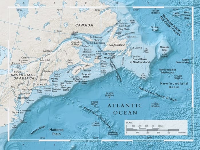 The Titanic shipwreck is located in the Newfoundland Basis right near the small triangle indicating 12, 740 ft. If it had sunk a few hundred miles further south the pieces of the ship would have fallen in valleys further south.