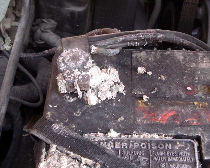This battery terminal has corroded to the point that it is no longer reliable and is in bad need of cleaning.