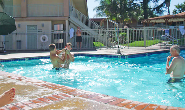 Motel pools almost always use chlorine to prevent transmitting disease from one guest to another. Warnings abound about washing your hair immediately after swimming to prevent yellow bleaching, and washing your swimsuit to prevent it fading out.